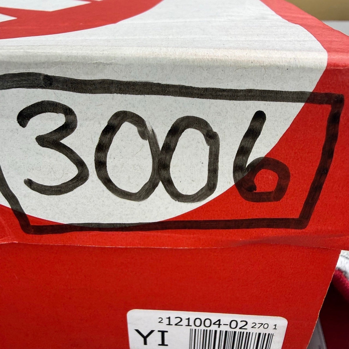 Nike deck shoes grey with red accents and logo, brand new in box.