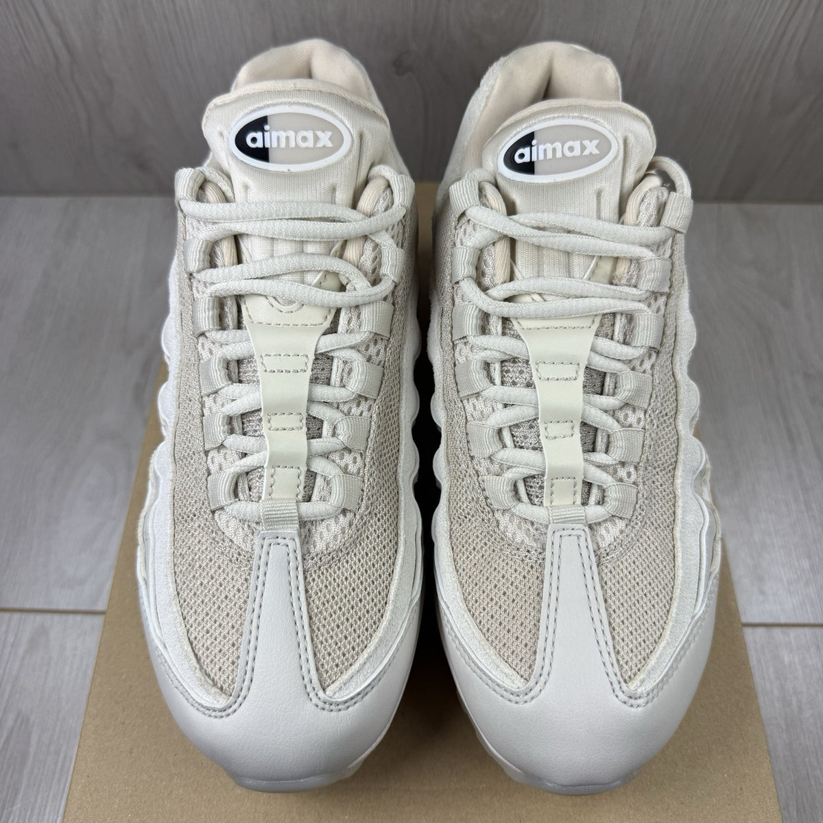 Nike Air Max 95 OG trainers beige with big bubble sole and logo detailing.