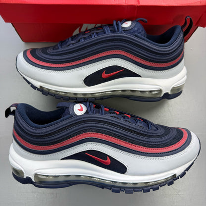 Nike Air Max 97 blue trainers with red accents and iconic logo detailing.