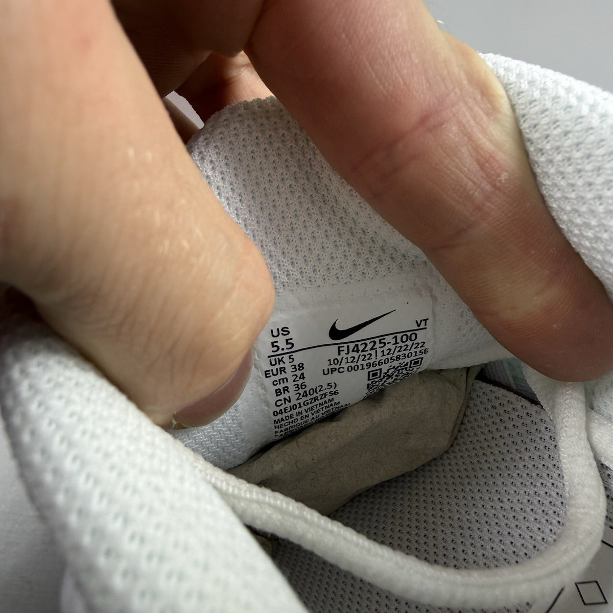 Nike Air Max Plus 3 white trainers with multi Swoosh logo and breathable mesh upper.