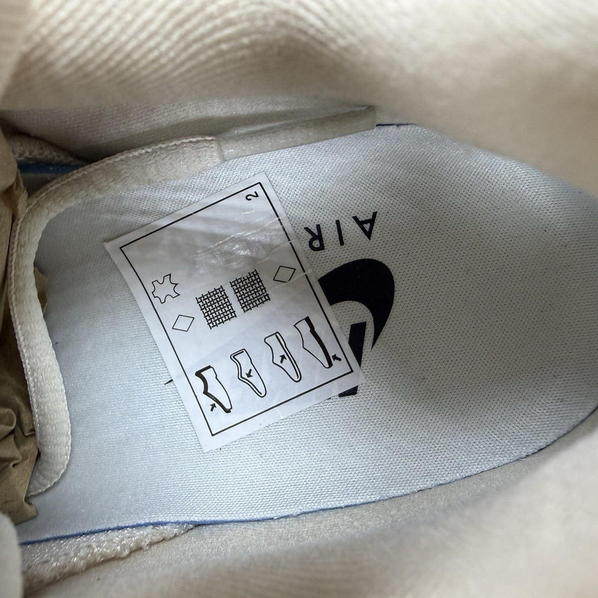 Nike Air Max 95 OG trainers beige with big bubble sole and logo detailing.