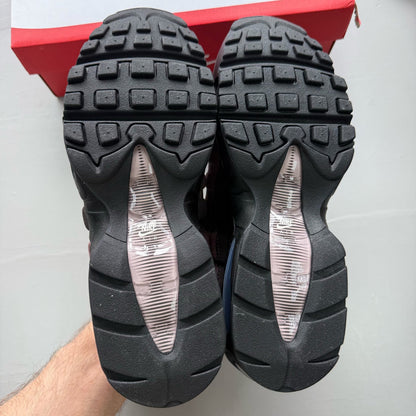 Nike black Air Max 95 trainers with big bubble design and light violet accents.