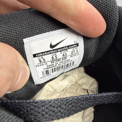 Nike black Air Max 1 Essential trainers with signature swoosh logo and mesh detailing.