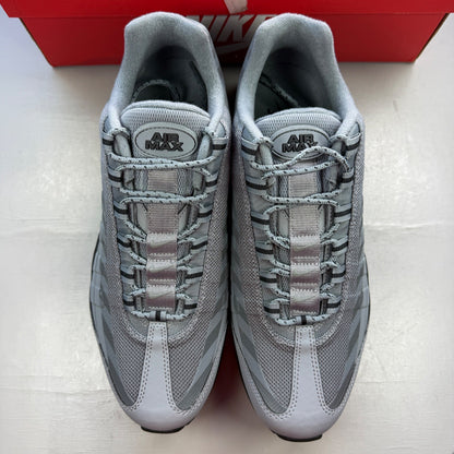 Nike Air Max 95 grey trainers with caution strip detailing and black accents.