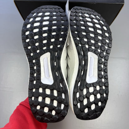 Adidas men's sneakers white with black accents and signature three-stripe logo.