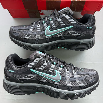 Nike P-6000 black trainers with hyper turquoise accents and grey detailing.