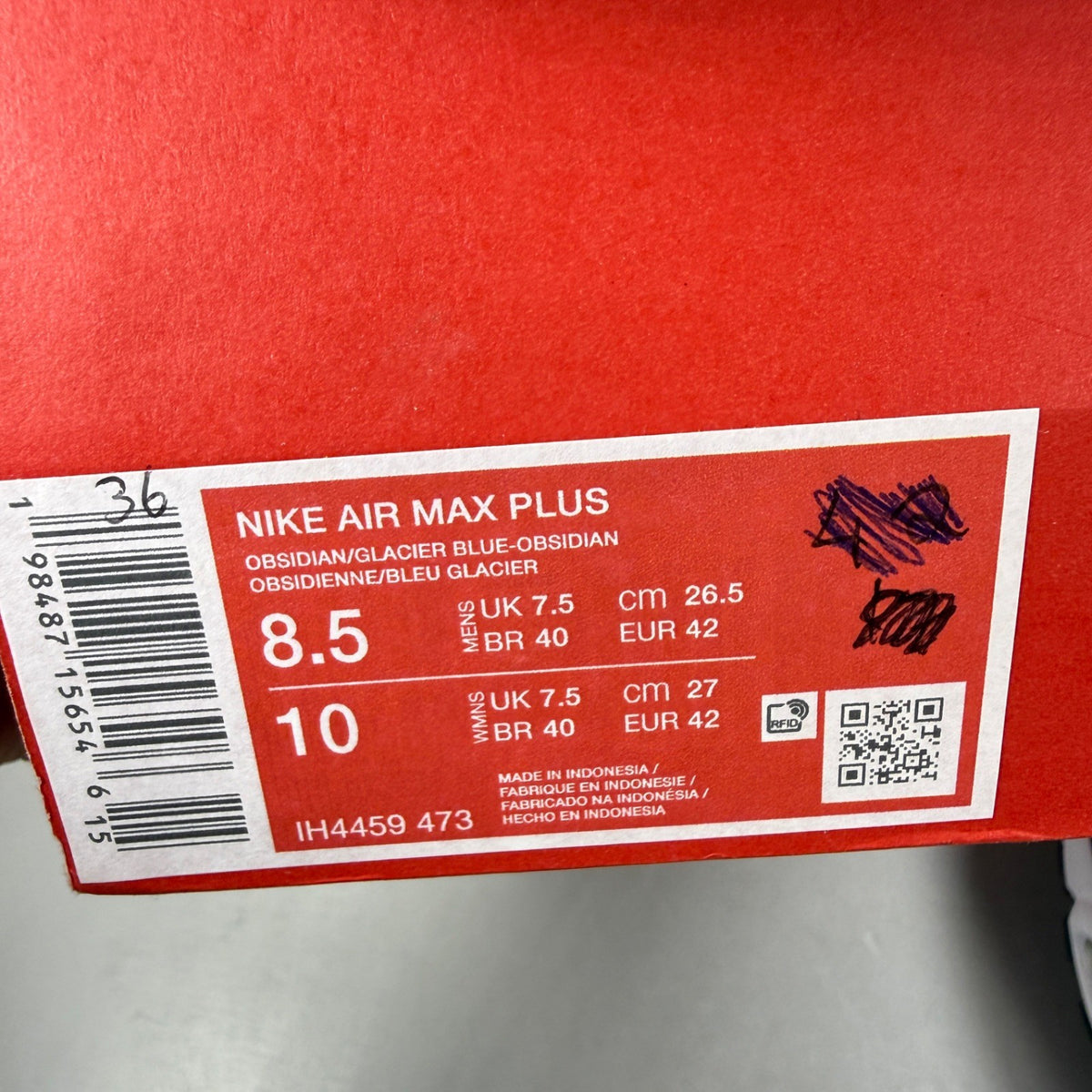 Nike blue deck shoes with logo detail and sleek design.