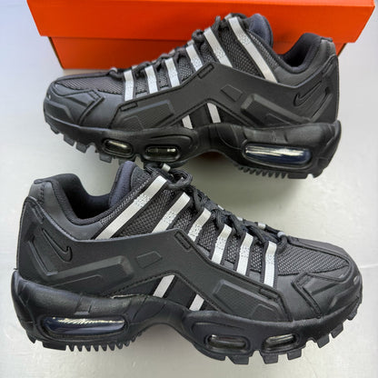 Nike Air Max 95 NDSTRKT black trainers with reflective detailing and logo accents.