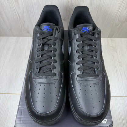 Nike black Air Force 1 Low trainers with jewel swoosh logo and grey accents.