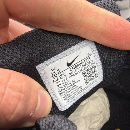 Nike trainers black with Air Max cushioning and signature swoosh logo.