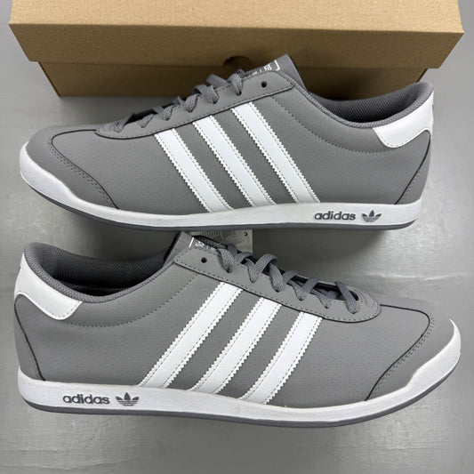 Adidas grey deck shoes with white accents and logo, made of leather.