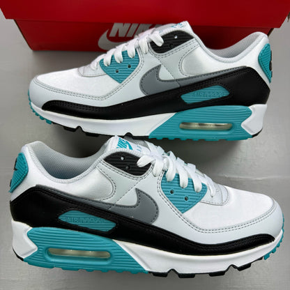Nike Air Max 90 white trainers with teal accents and visible logo detail.