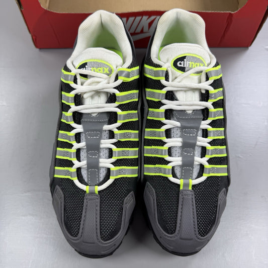 Nike Air Max 95 trainers grey with neon volt accents and distinctive layered upper design.