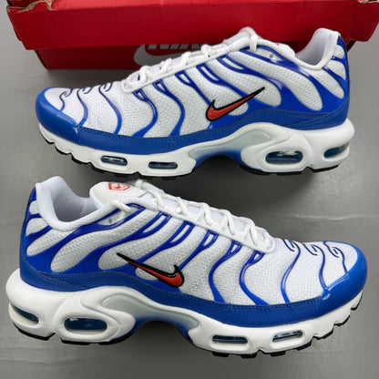 Nike trainers white with signal blue accents and distinctive Air Max Plus design.