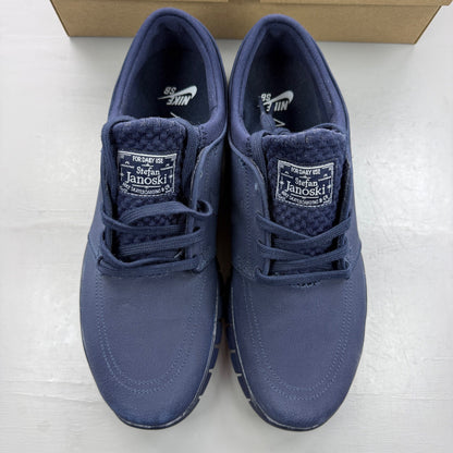 Nike deck shoes blue with logo detailing and cushioned sole design.