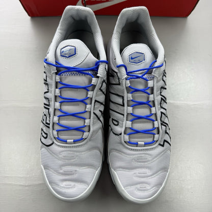 Nike Air Max Plus TN trainers grey with blue accents and signature swoosh logo.