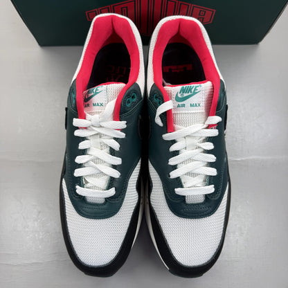 Nike Air Max 1 white trainers with LeBron James logo and Liverpool FC details.