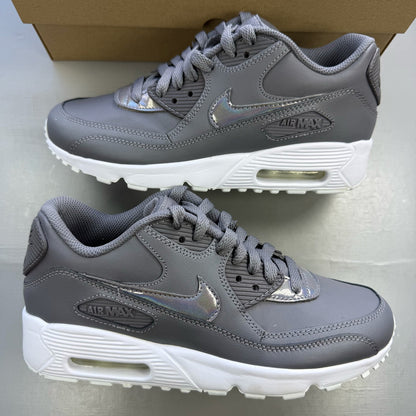 Nike Air Max 90 grey trainers with white accents and logo detail.