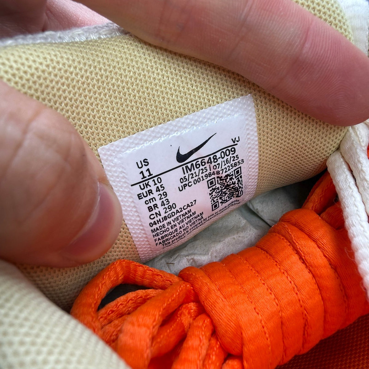 Nike P-6000 grey trainers with mesh upper and subtle logo detailing.