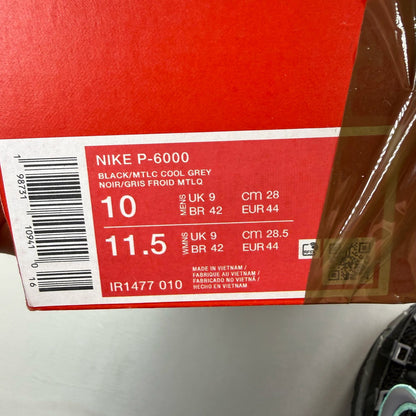 Nike P-6000 black trainers with hyper turquoise accents and grey detailing.