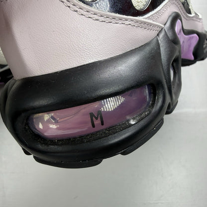 Nike Air Max Plus TN white trainers with black and purple accents, custom writing on bubbles.