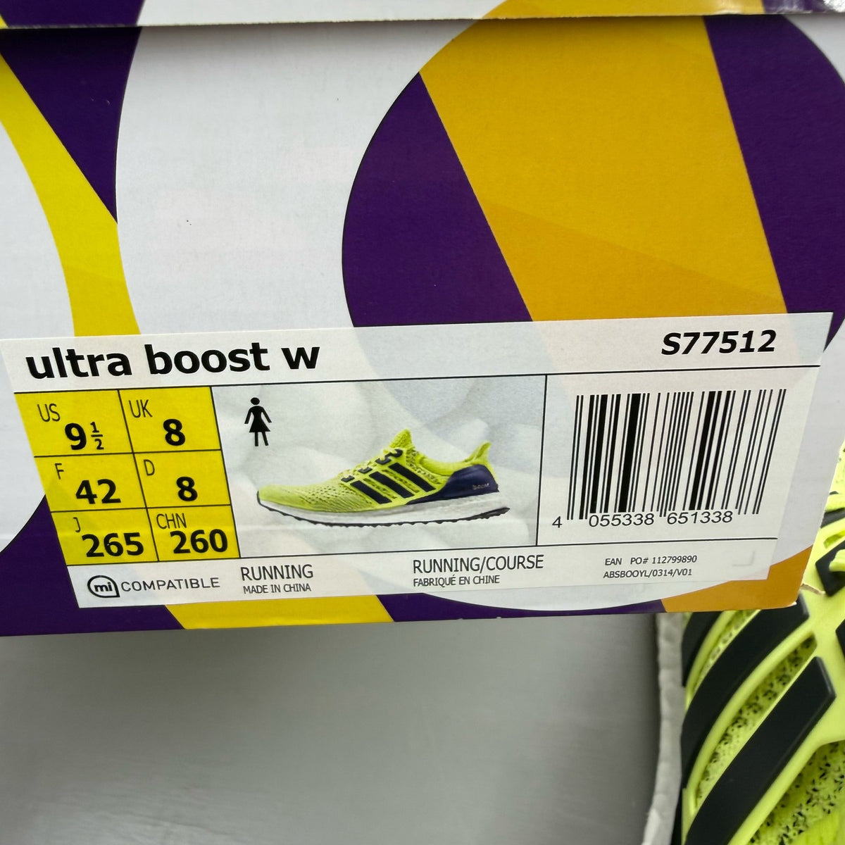 Adidas UltraBoost 1.0 yellow trainers with black and white accents, mesh upper.