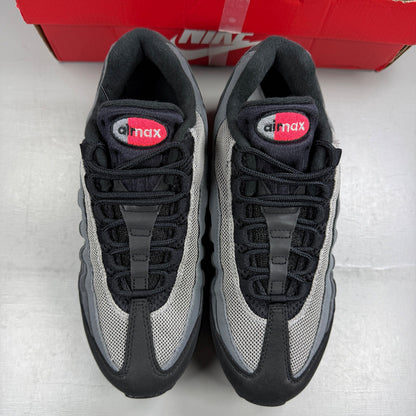 Nike deck shoes black with bright crimson accents and signature logo details.