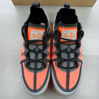 Nike grey trainers with total orange accents and Air VaporMax cushioning.