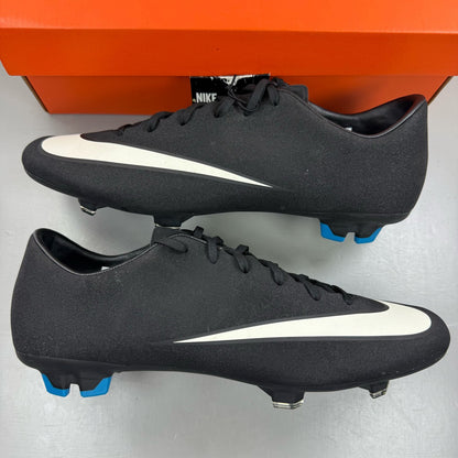 Nike black football boots with white Mercurial logo, sleek design, synthetic material.