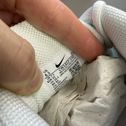 Nike Air Max Plus TN 3 white trainers with logo detailing and mesh upper.