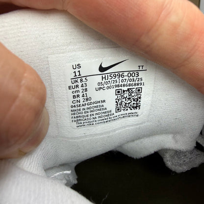 Nike Air Max 95 grey trainers with big bubble sole and logo detailing.