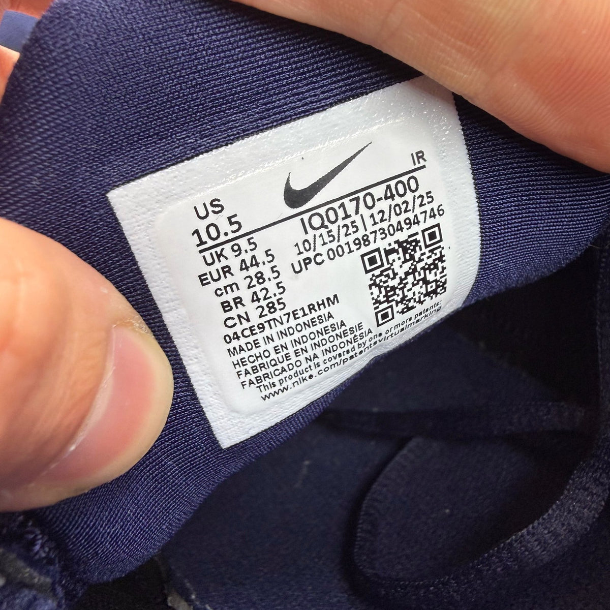 Nike soccer ball blue with French Football Federation logo and textured surface.