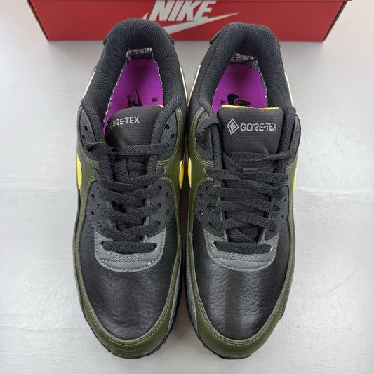 Nike Air Max 90 trainers black with Gore-Tex material and cargo khaki accents.