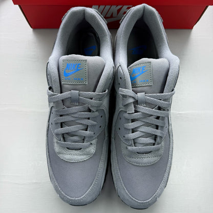 Nike Air Max 90 grey trainers with light blue accents and signature logo.