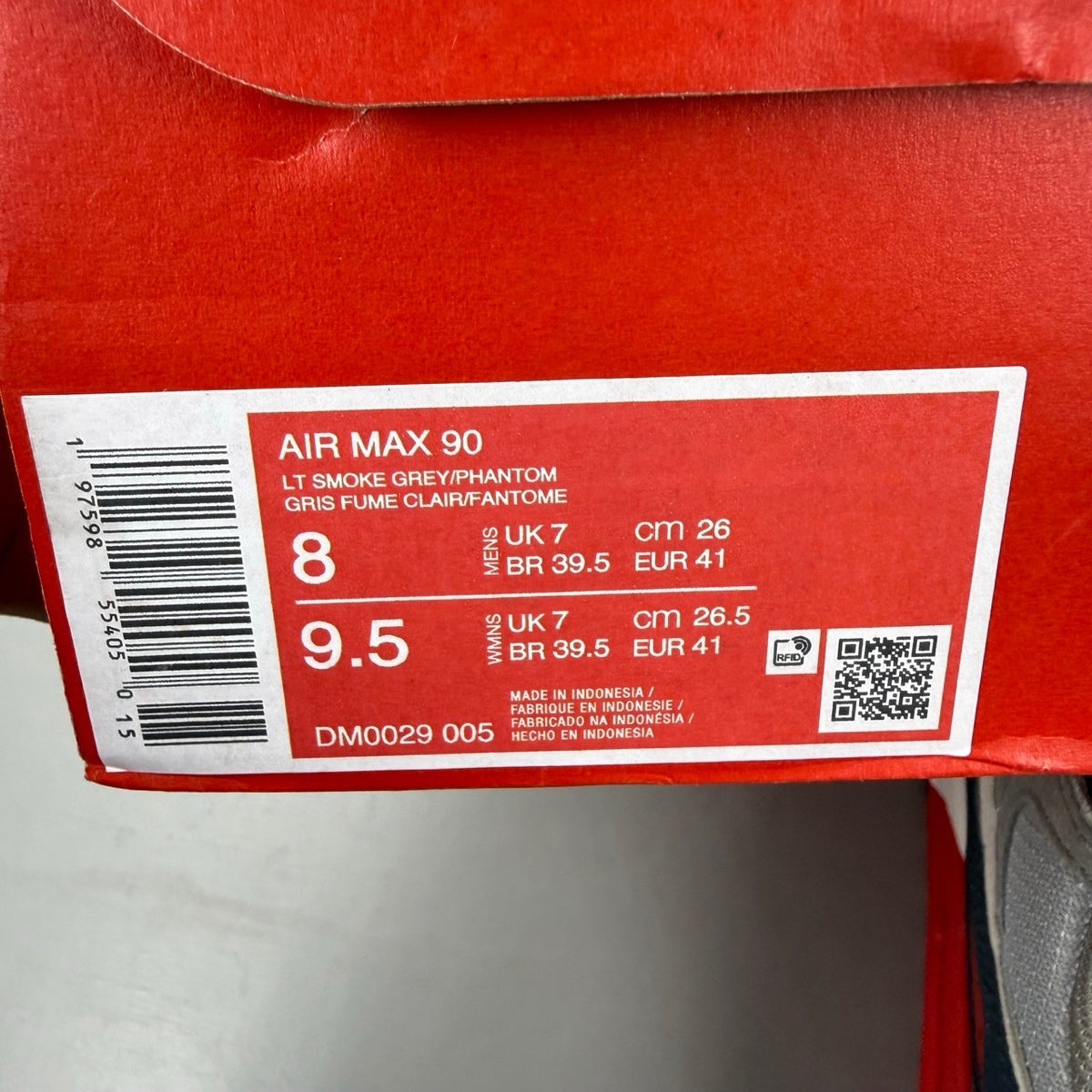 Nike deck shoes grey with red accents and logo, brand new in box.