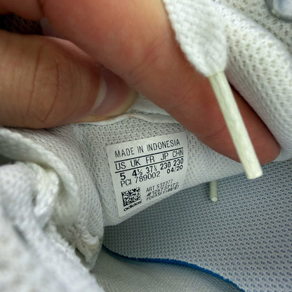 Adidas ZX Flux white running trainers with clear grey accents and minimalist design.