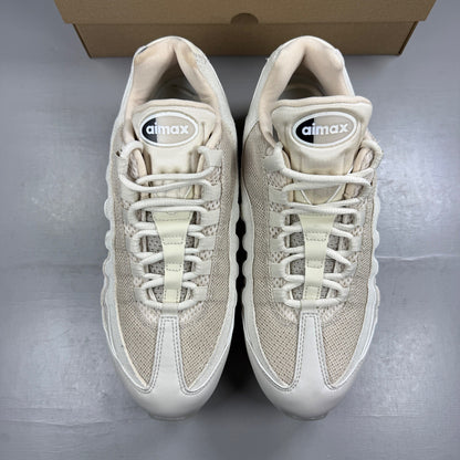 Nike trainers white with big bubble sole and iconic swoosh logo.