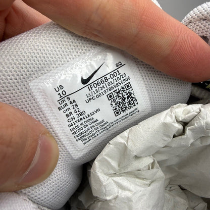 Nike P-6000 grey trainers with mesh upper and signature swoosh logo.