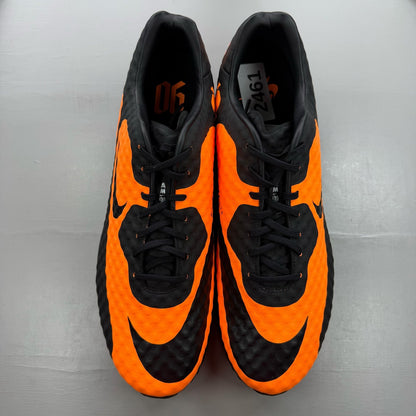 Nike black trainers with bright citrus accents and Hypervenom design details.