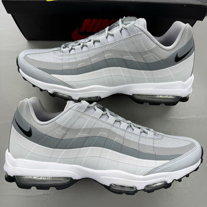 Nike Air Max 95 Ultra grey trainers with black and white accents, mesh and leather material.