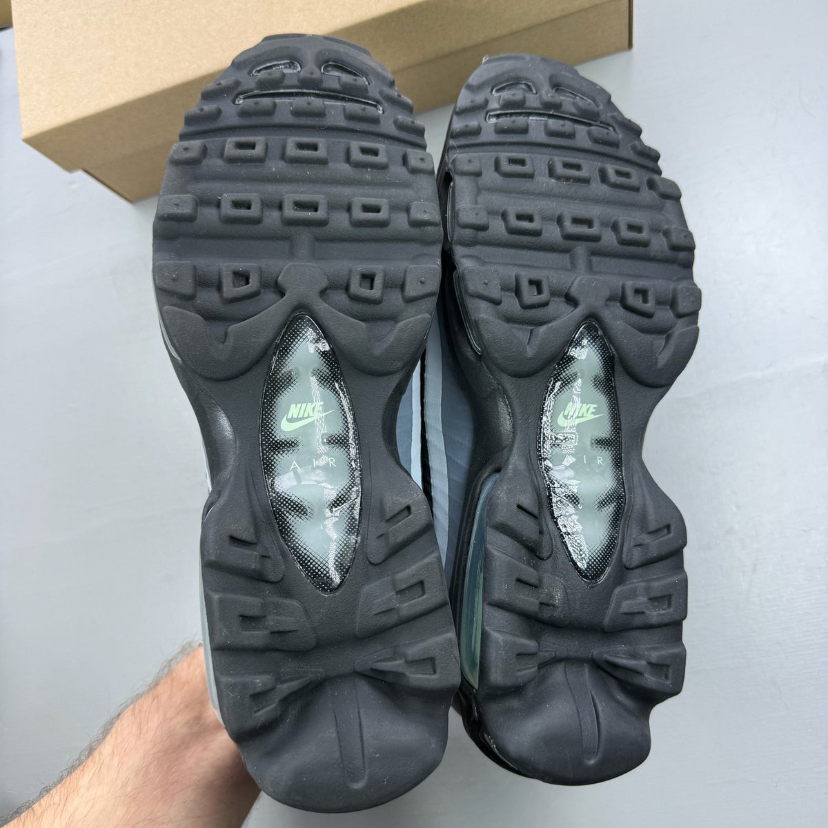 Nike Air Max 95 Ultra black trainers with mint foam accents and anthracite detailing.