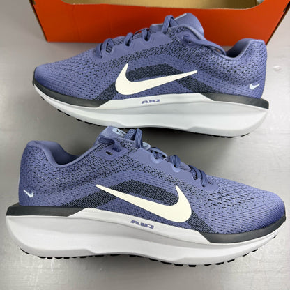 Nike blue trainers with mesh upper and swoosh logo, size UK 6.
