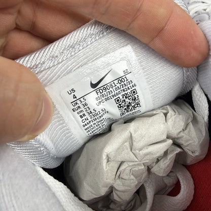 Nike Air Max 1 trainers grey with white accents and signature swoosh logo.