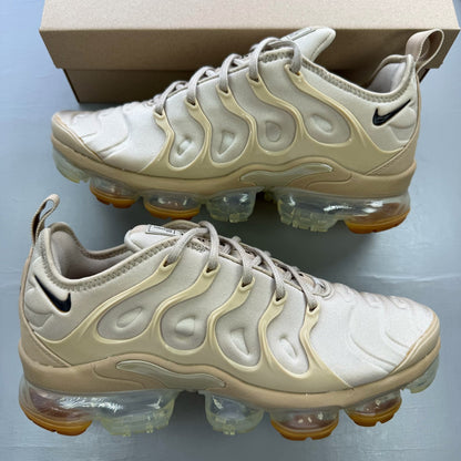 Nike Air VaporMax Plus trainers brown with mesh upper and signature swoosh logo.