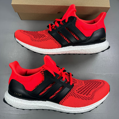 Adidas Ultra Boost trainers multi-colour with mesh upper and signature three stripes logo.