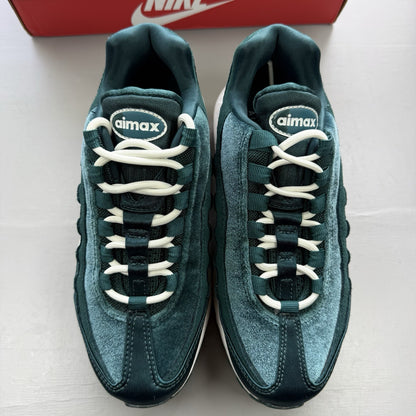 Nike Air Max 95 green velvet trainers with teal accents and white sole.