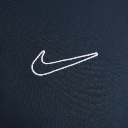 Nike blue Dri-FIT 1/4 zip top with logo and breathable material.