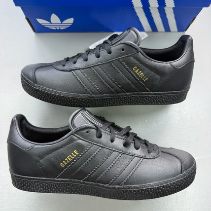 Adidas black Gazelle trainers leather upper with iconic three stripes logo.