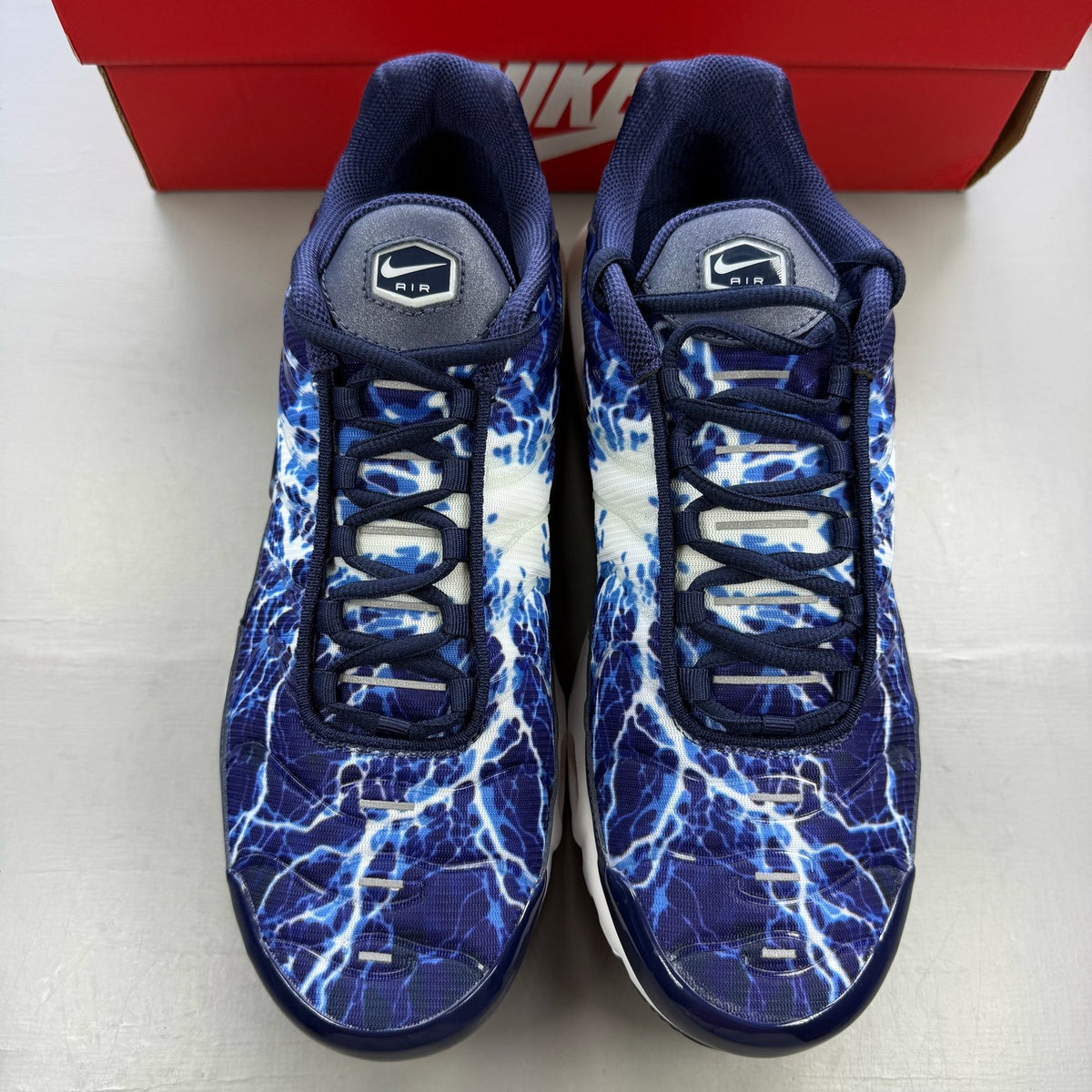 Nike Air Max Plus TN trainers multi-colour with lightning pattern and signature logo.