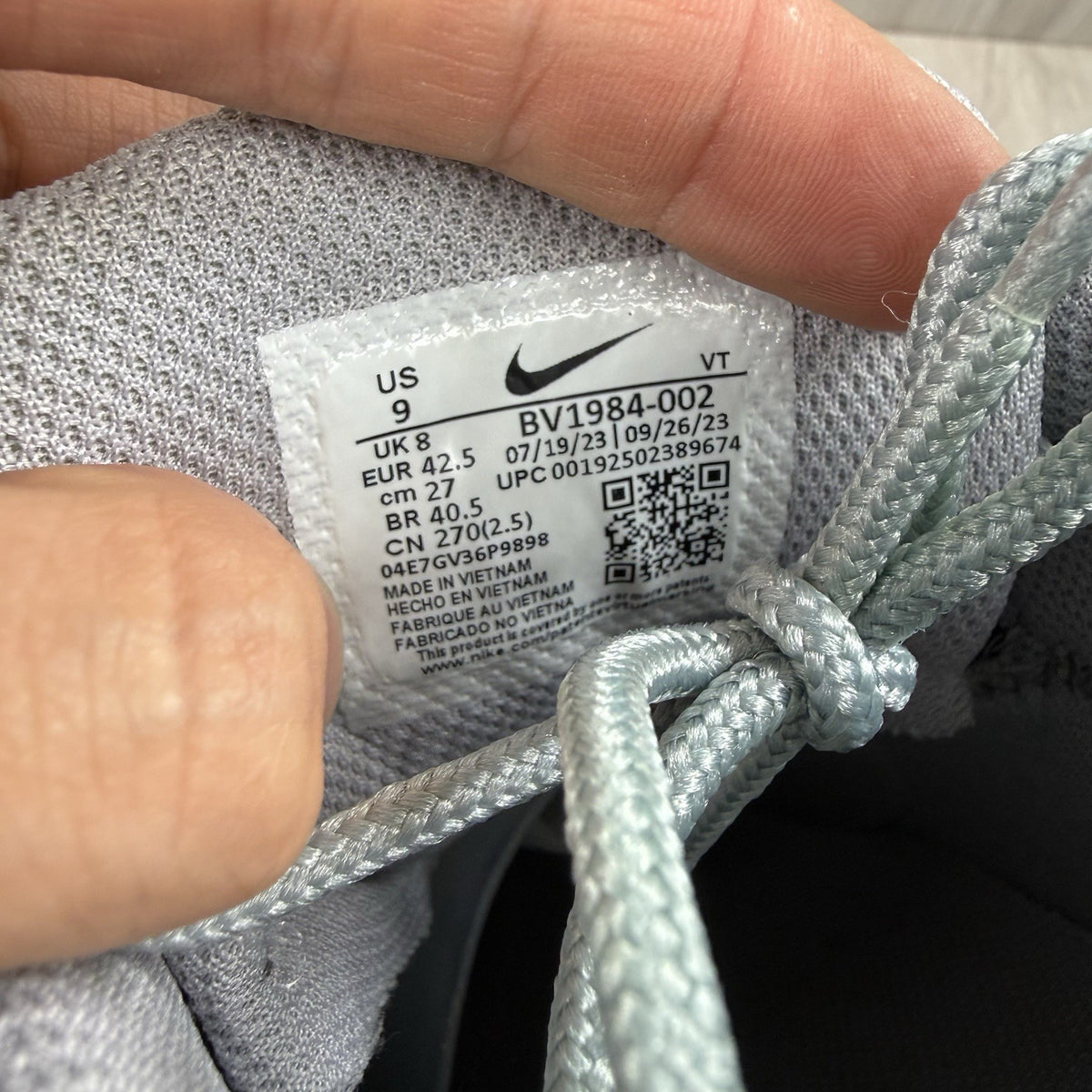 Nike Air Max 95 Ultra grey trainers with white accents and signature logo detailing.